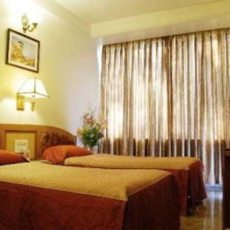 Hotel Mandakini Ambience Pune Zimmer foto