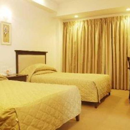 Hotel Mandakini Ambience Pune Zimmer foto