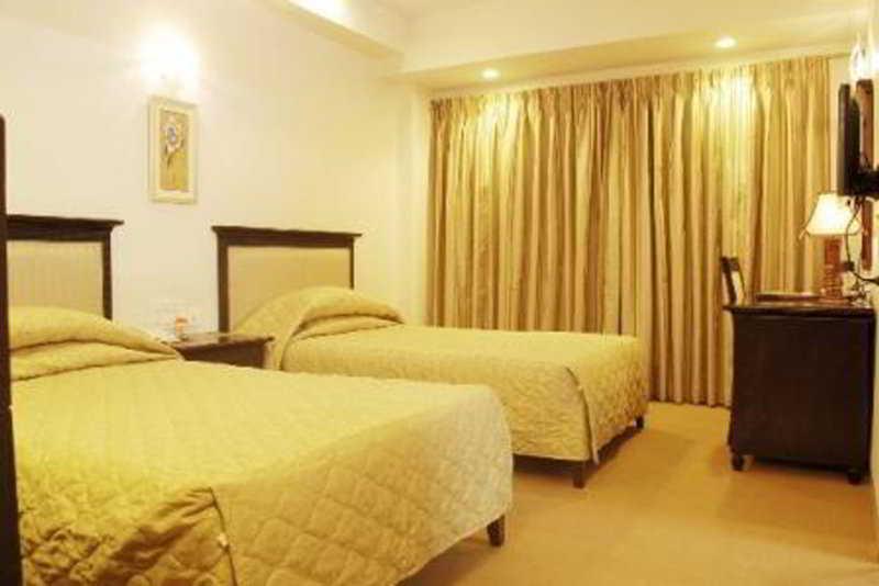 Hotel Mandakini Ambience Pune Zimmer foto